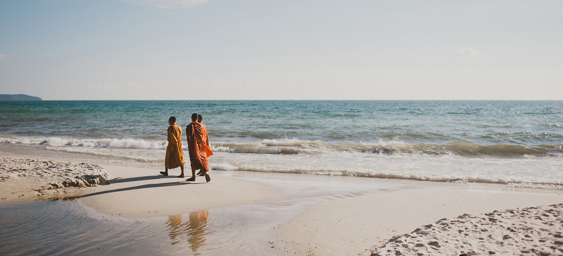 Photographing monks on the coast of Cambodia.
