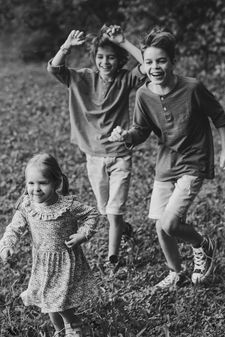 Photographing children during play.